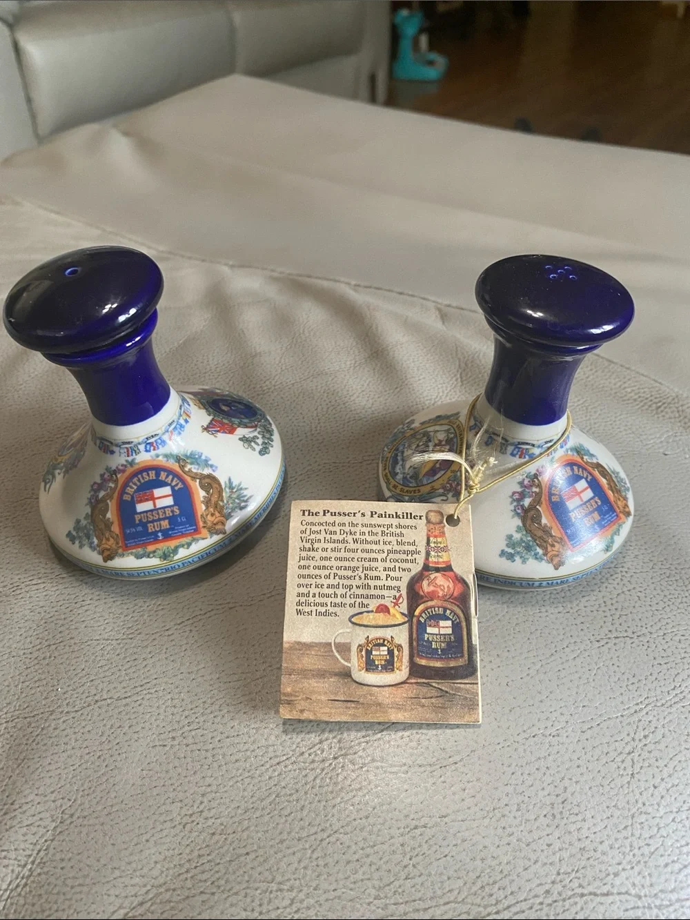 Two Vintage Pussers Rum decanters